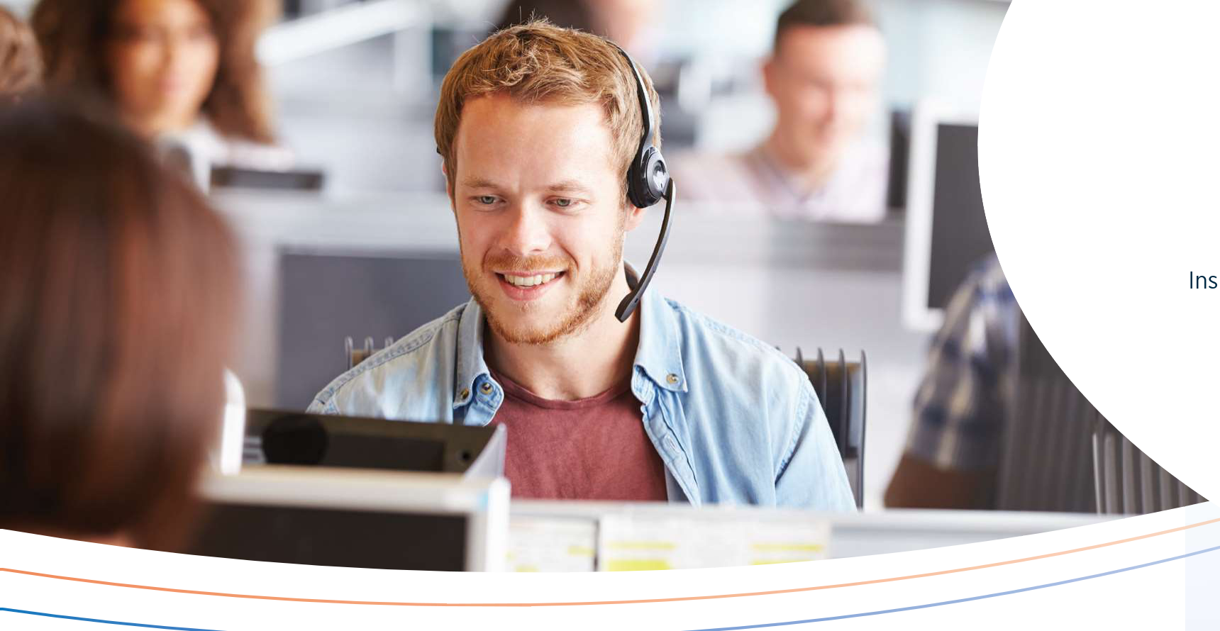 Gallagher healthcare advocate wearing headset speaking with colleague in office environment