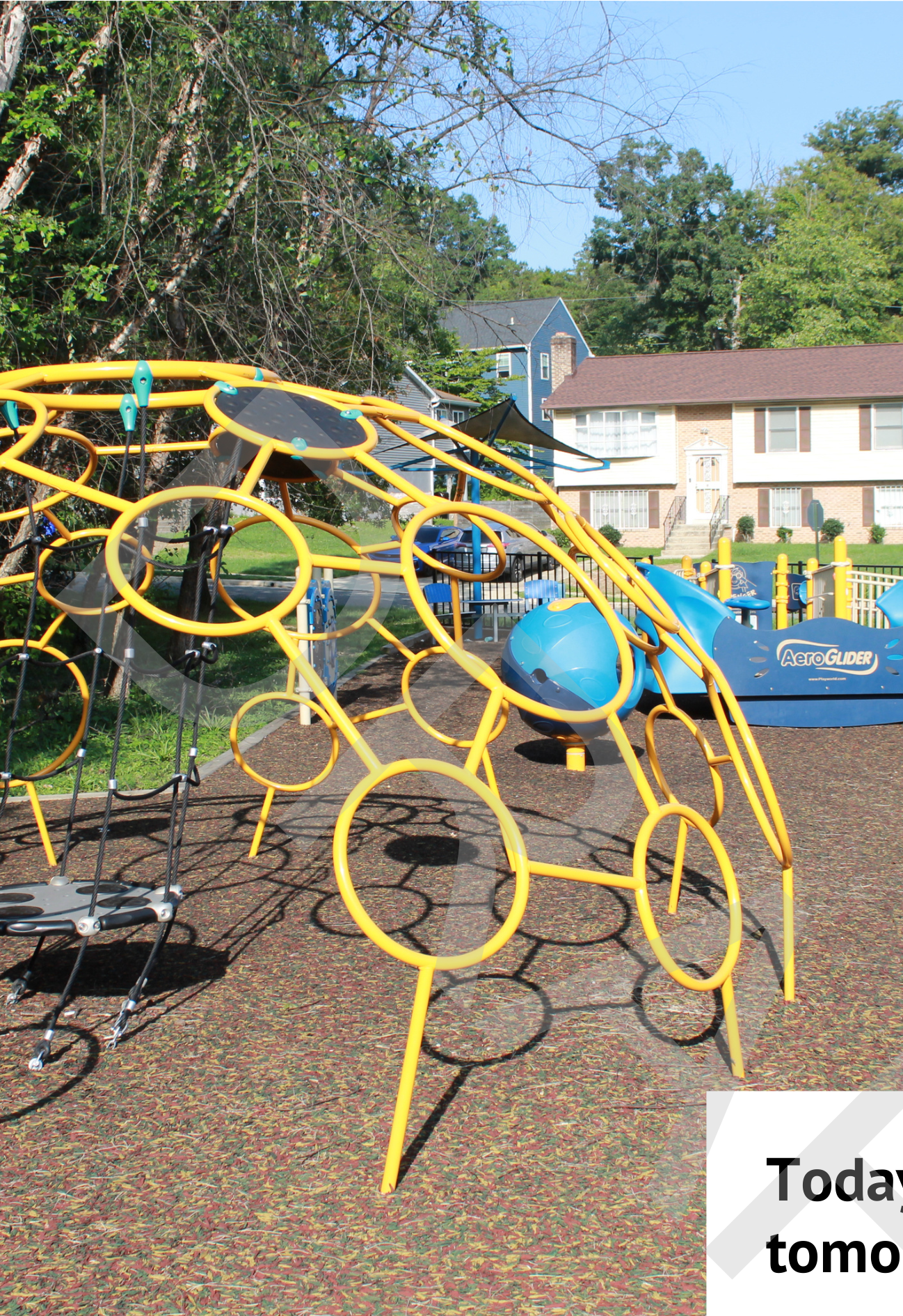Cheverly park playground equipment featuring yellow climbing dome