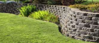 Stone retaining wall in a landscaped garden