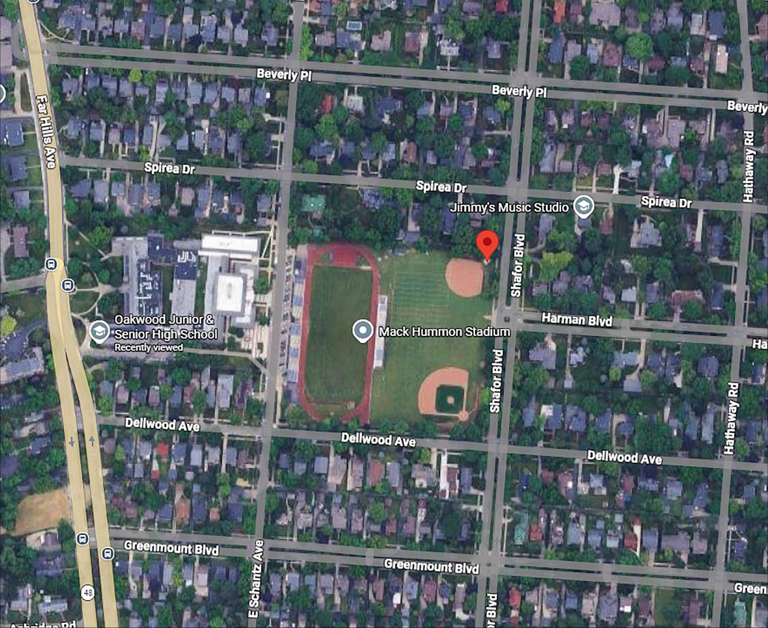 Aerial satellite map showing project vicinity at Oakwood Junior and Senior High School, Mack Hummon Stadium, Dellwood Ave, Shafor Blvd, and Schantz Ave.