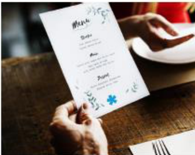 Example of an allergen notification printed at the bottom of a handheld restaurant menu