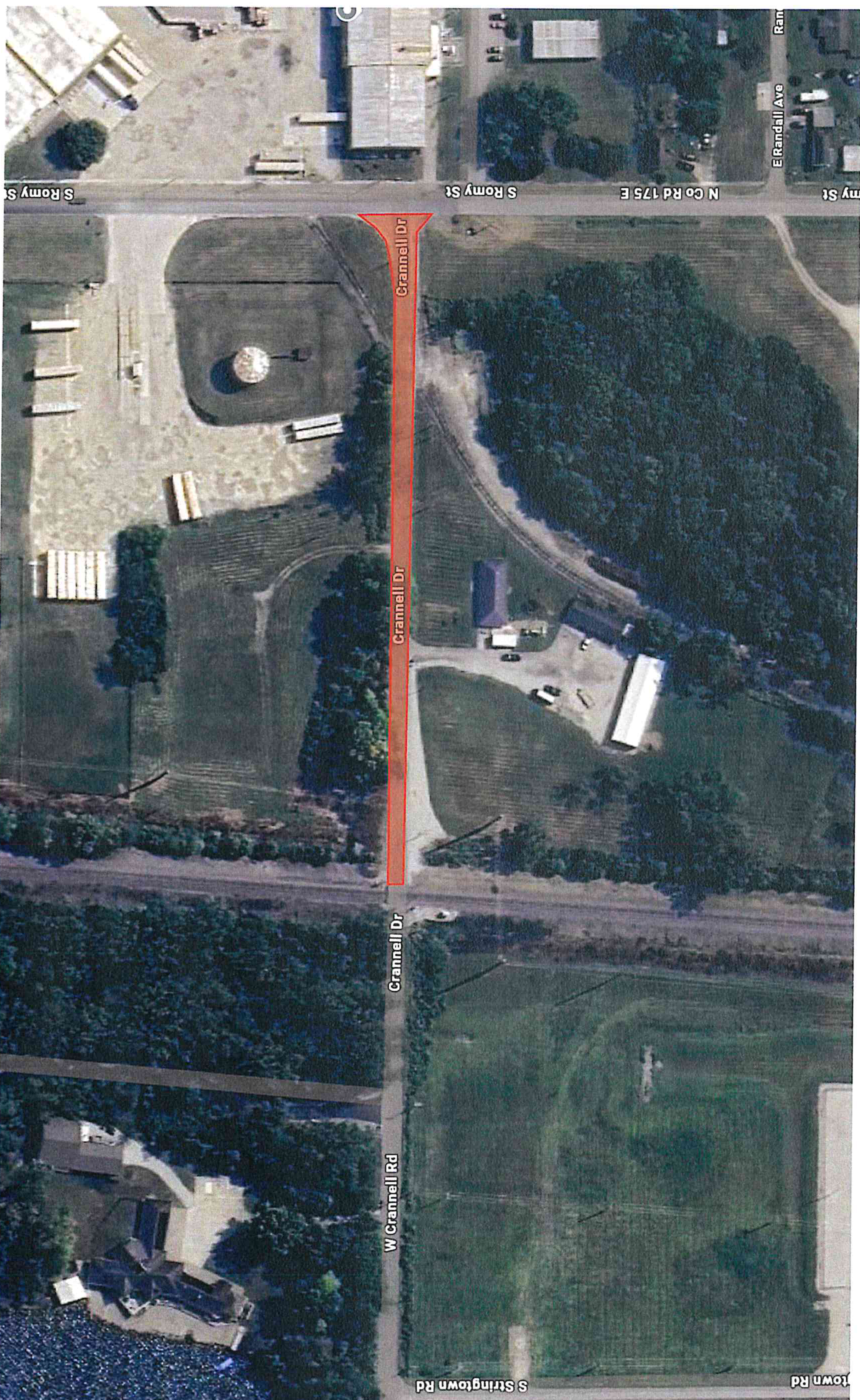 Aerial satellite map view showing Crannell Dr highlighted in red, extending east towards S Romy St and N Co Rd 175 E, crossing railroad tracks near W Crannell Rd and S Stringtown Rd.