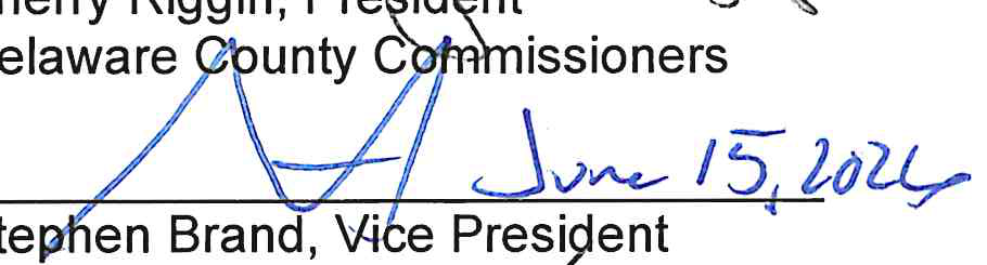 Handwritten signature and date