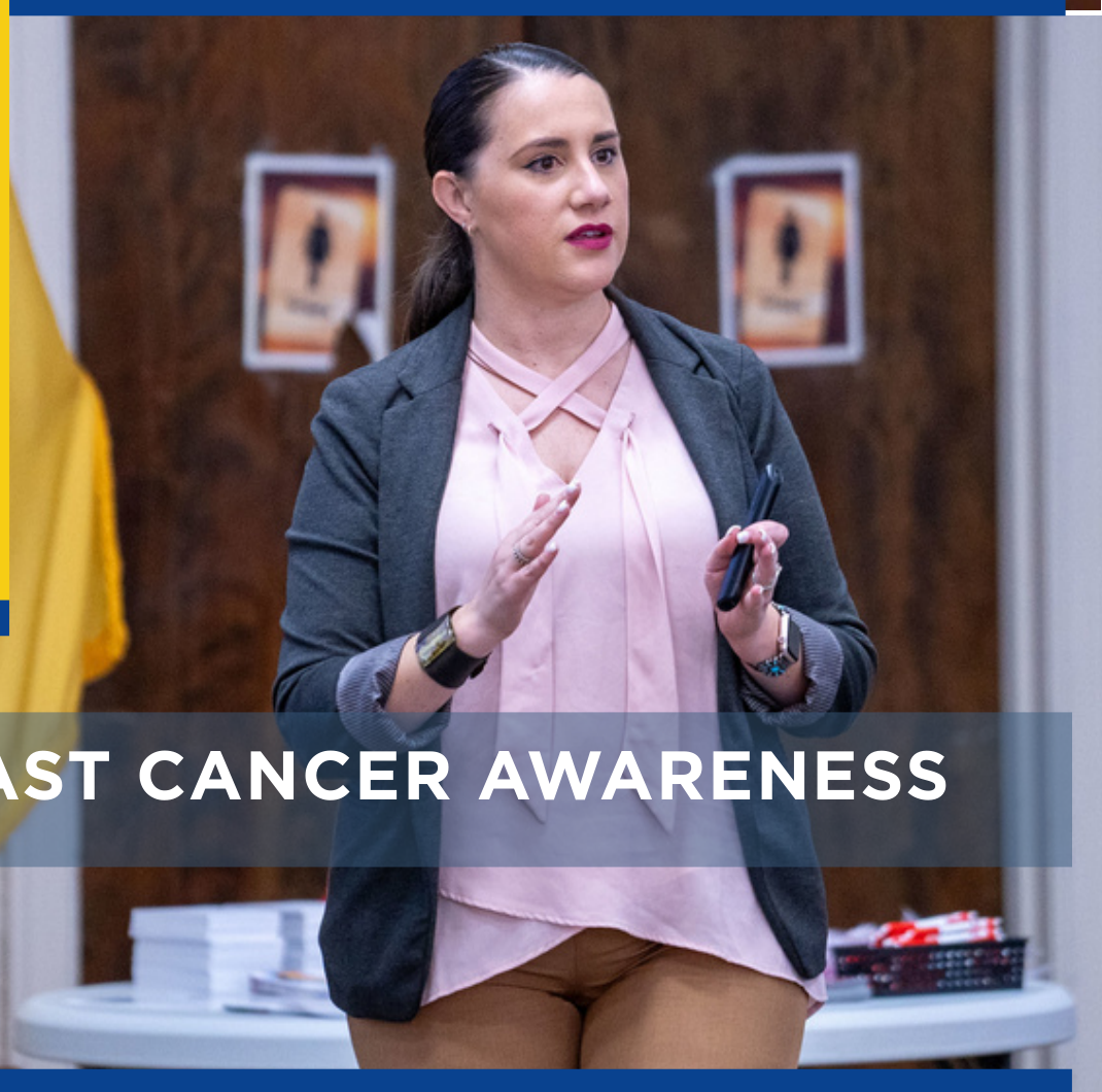 Speaker giving a presentation on Breast Cancer Awareness