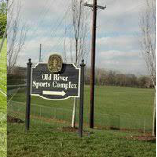 Old River Sports Complex entrance sign and athletic fields