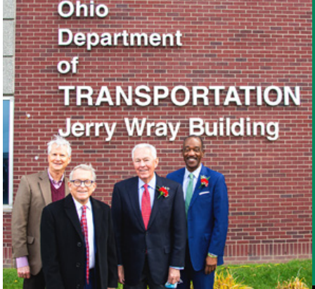 Former ODOT directors standing in front of the Ohio Department of Transportation Jerry Wray Building