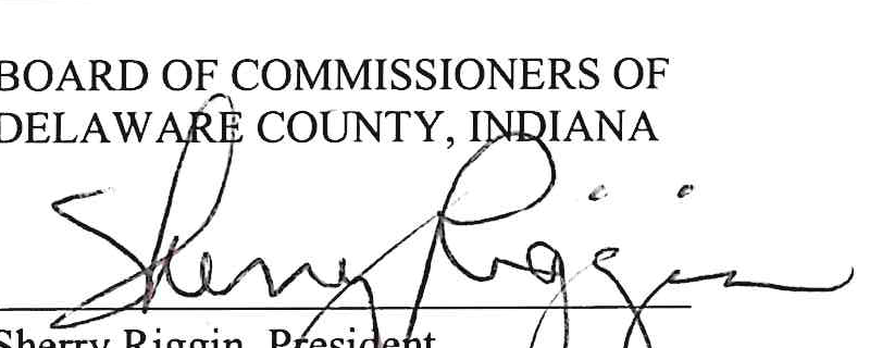 Handwritten signature of Sherry Riggin