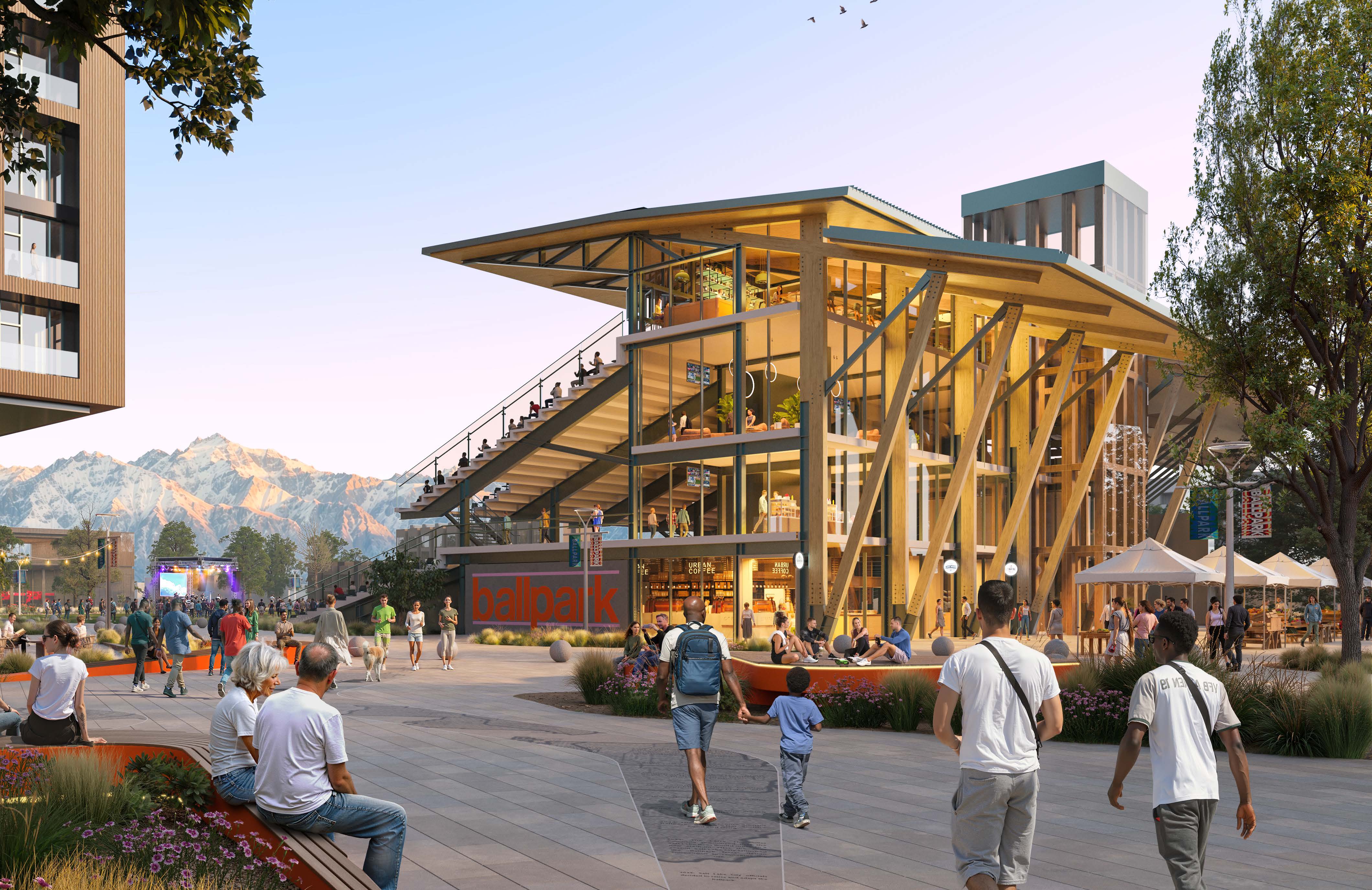 Architectural rendering of the Ballpark public plaza with a timber building, outdoor seating, people, trees, a performance screen, and mountains beyond.