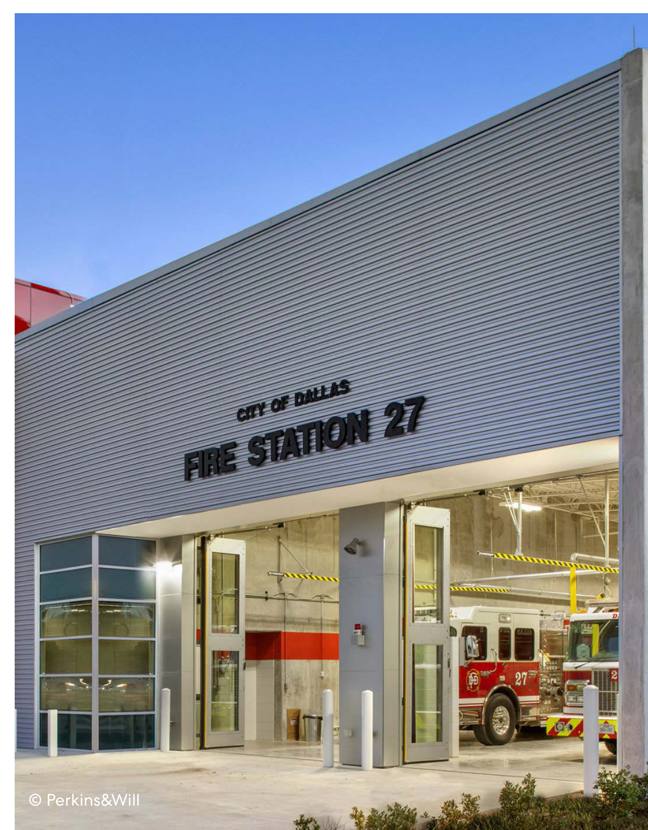 Fire Station 8 exterior with four truck bays.
