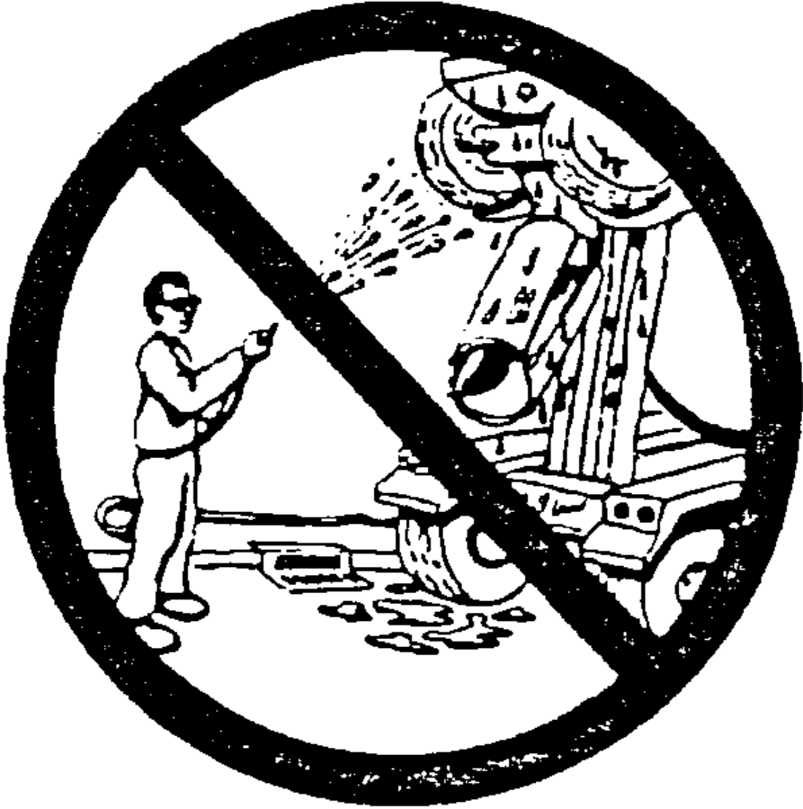 Prohibited: Truck leaking oil into a storm drain.