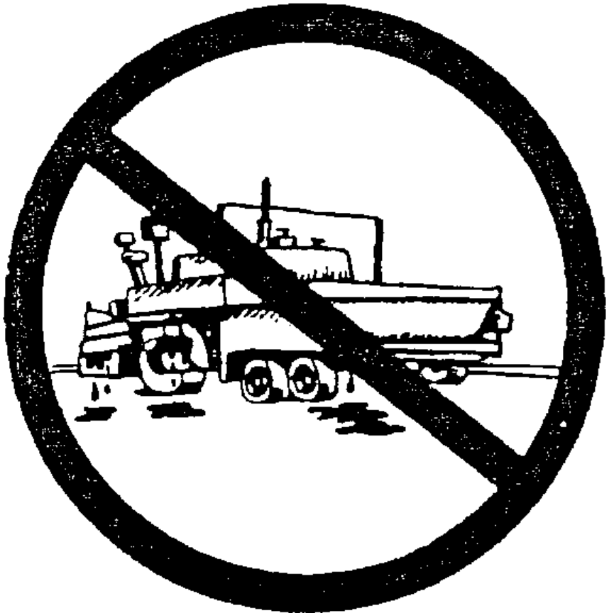 Prohibited: Paving machinery leaking into a storm drain.