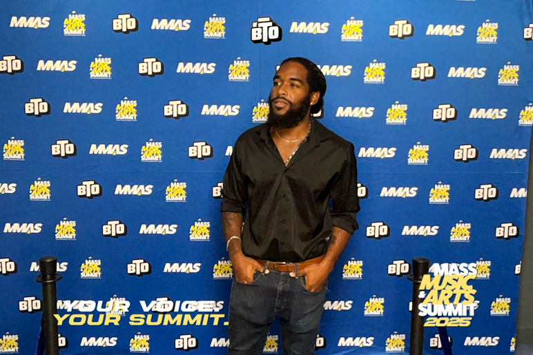 Jabz York posing at the Mass Music & Arts Summit