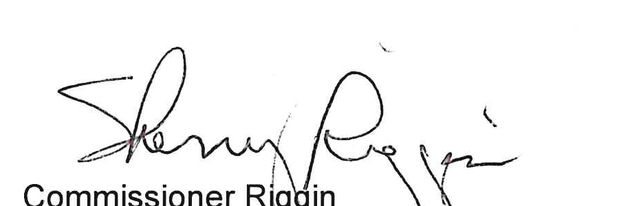 Signature of Commissioner Riggin
