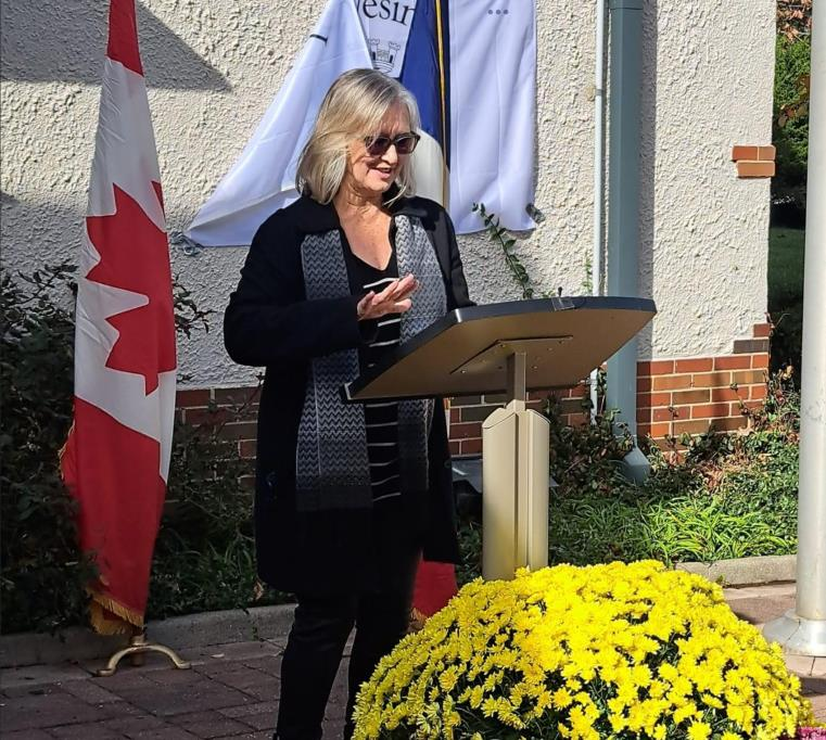 Speaker at podium during Mayor's Reception ceremony