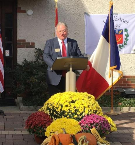 Mayor speaking at podium