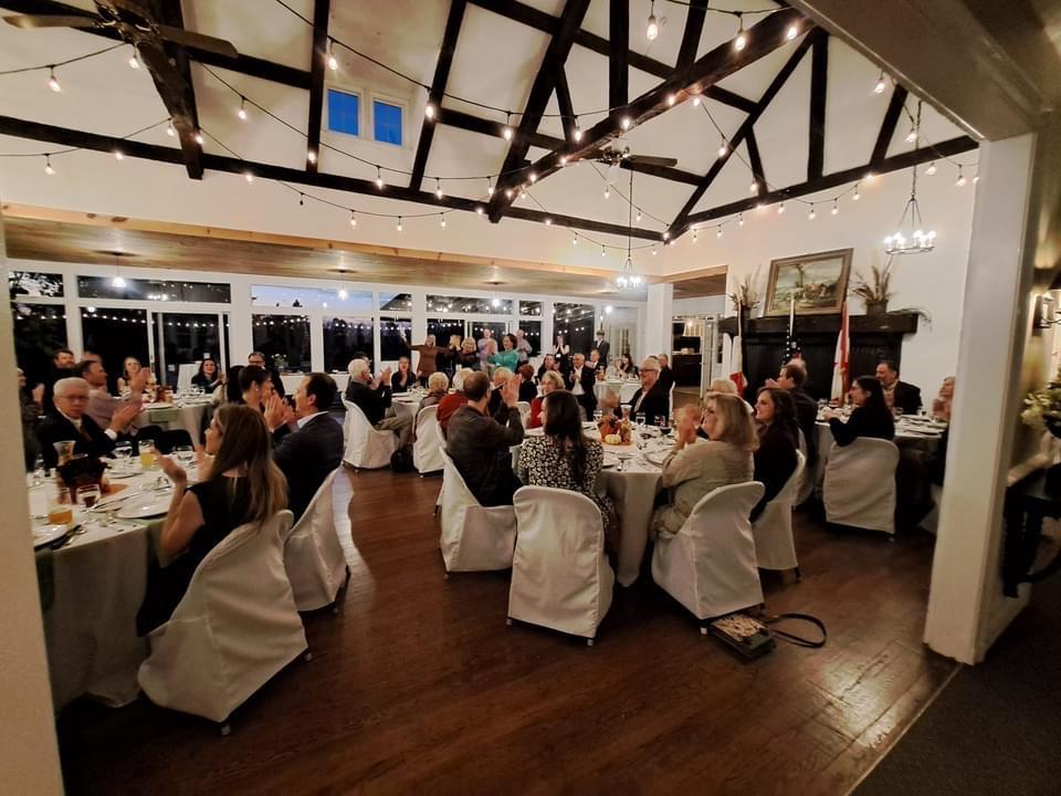 Wide view of the Gala Dinner hall with guests at tables