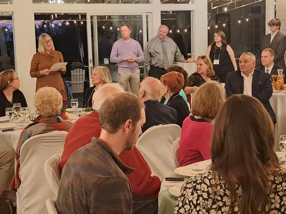 Guests watching presentation during the Gala Dinner