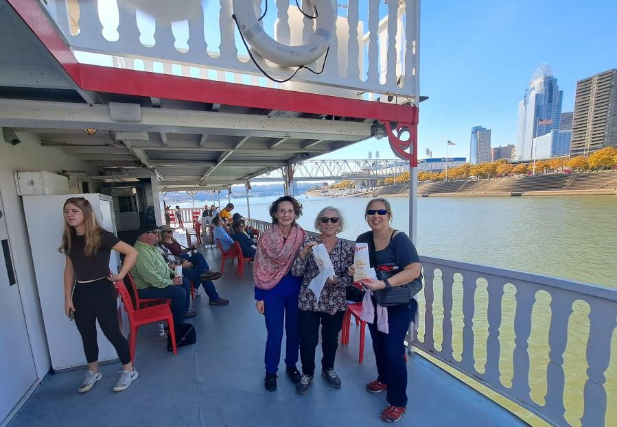 Group enjoying the cruise on the riverboat deck