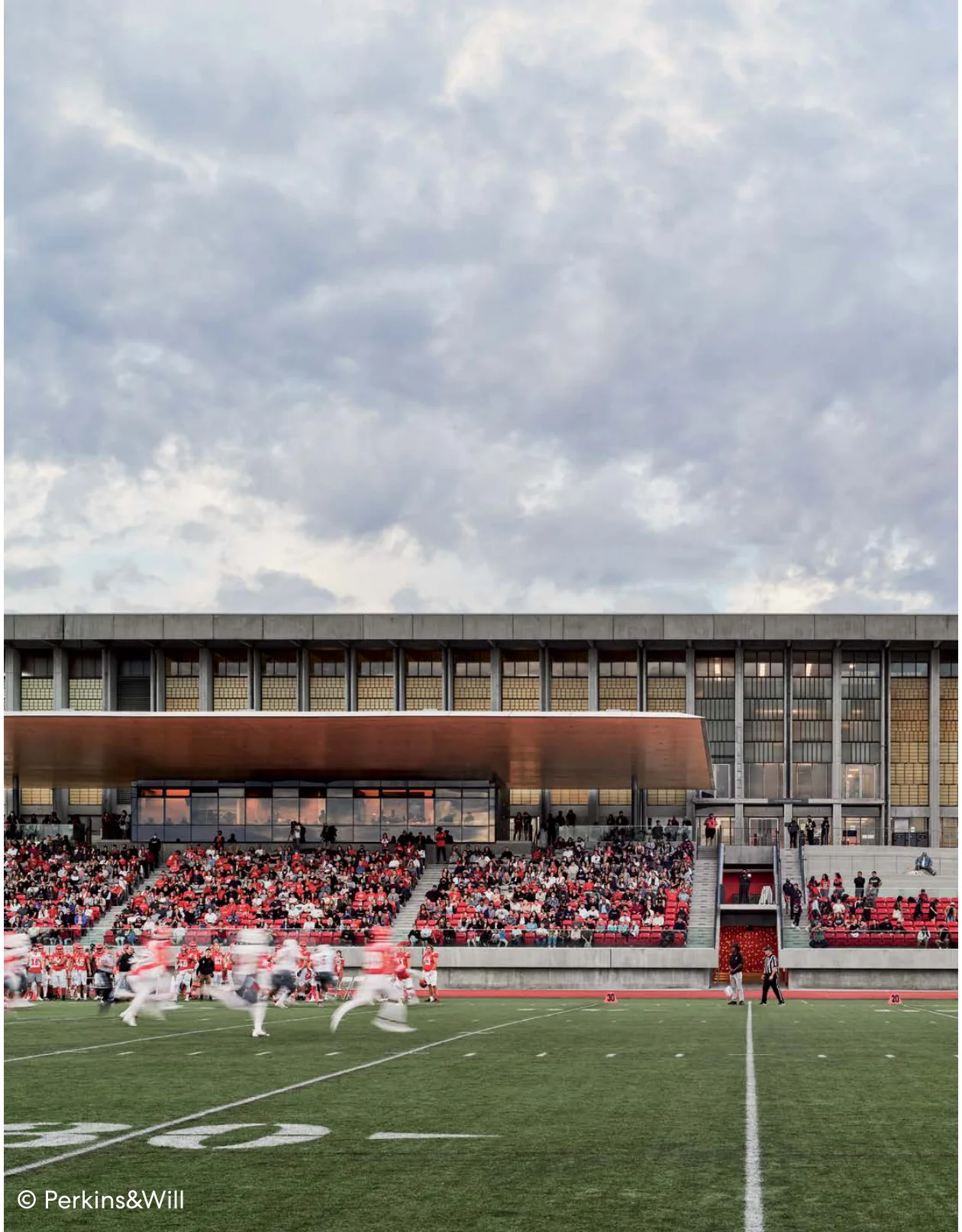 Athletic field and stadium seating with crowds during an event