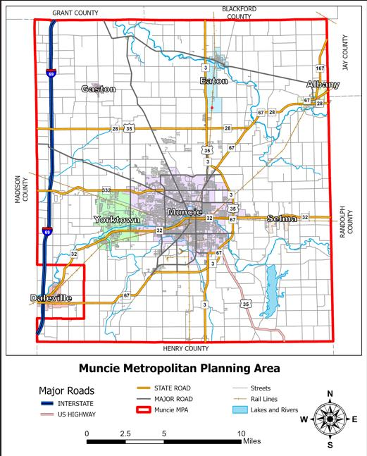 Map of the Muncie Metropolitan Planning Area, with the MPA boundary, nearby counties, communities, roads, rail lines, lakes, rivers, legend, scale bar, and compass.