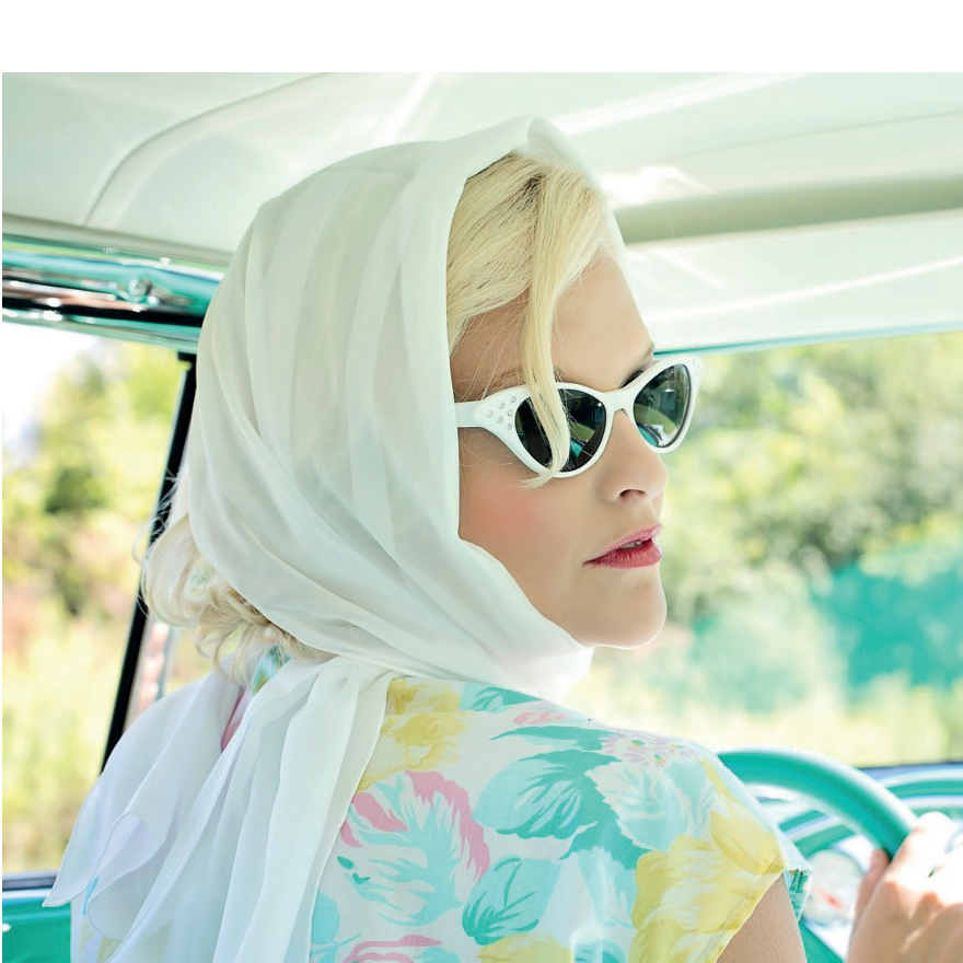 Woman in classic car
