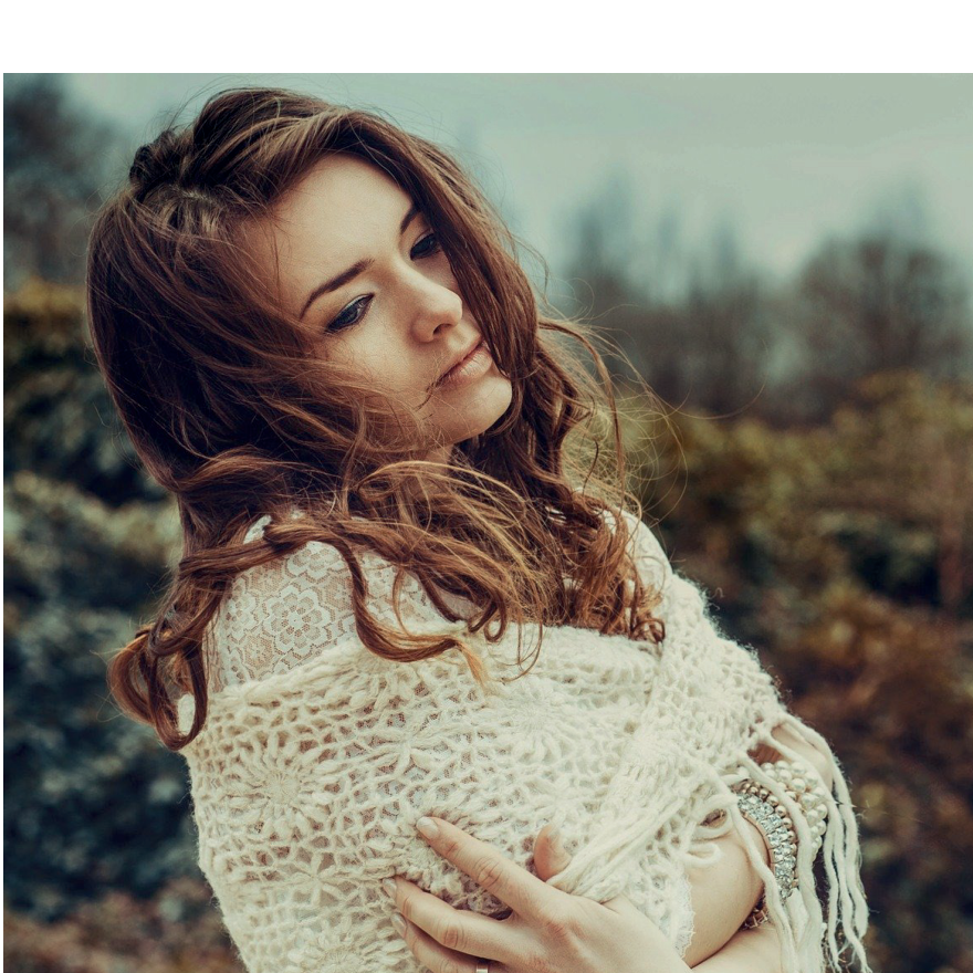 Woman wrapped in white fabric