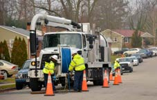 New Jersey American Water maintenance truck and field crew working on street