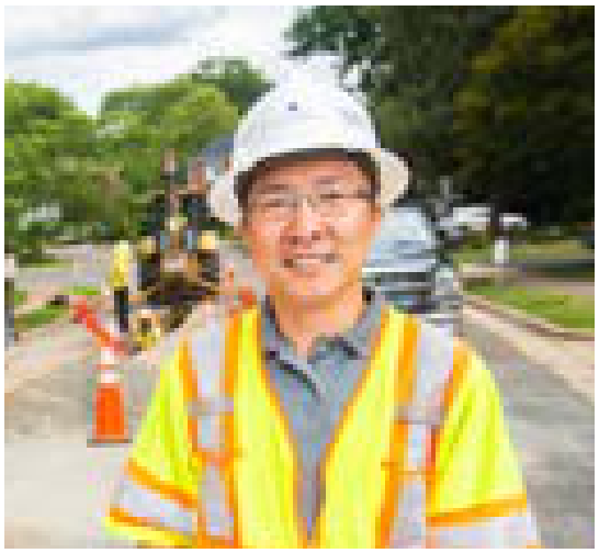Field engineer wearing hard hat and high-vis vest