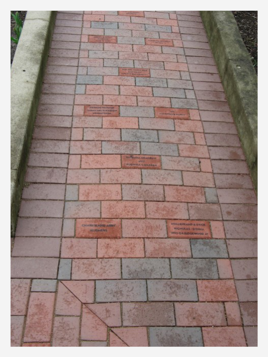 Brick walkway with personalized donor pavers in Smith Gardens