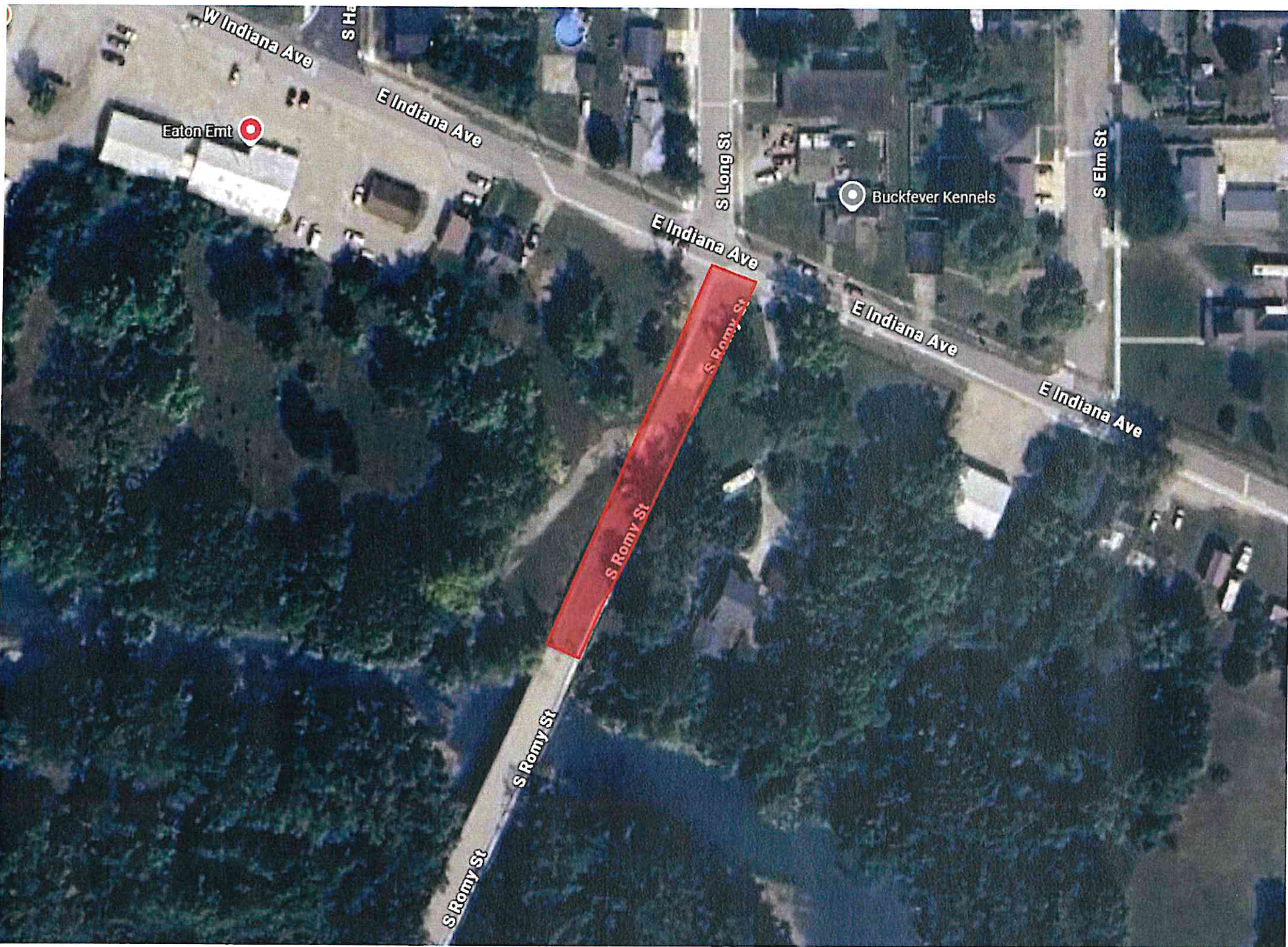 Aerial satellite photograph showing S Romy St and E Indiana Ave with a red highlighted property section along S Romy St.