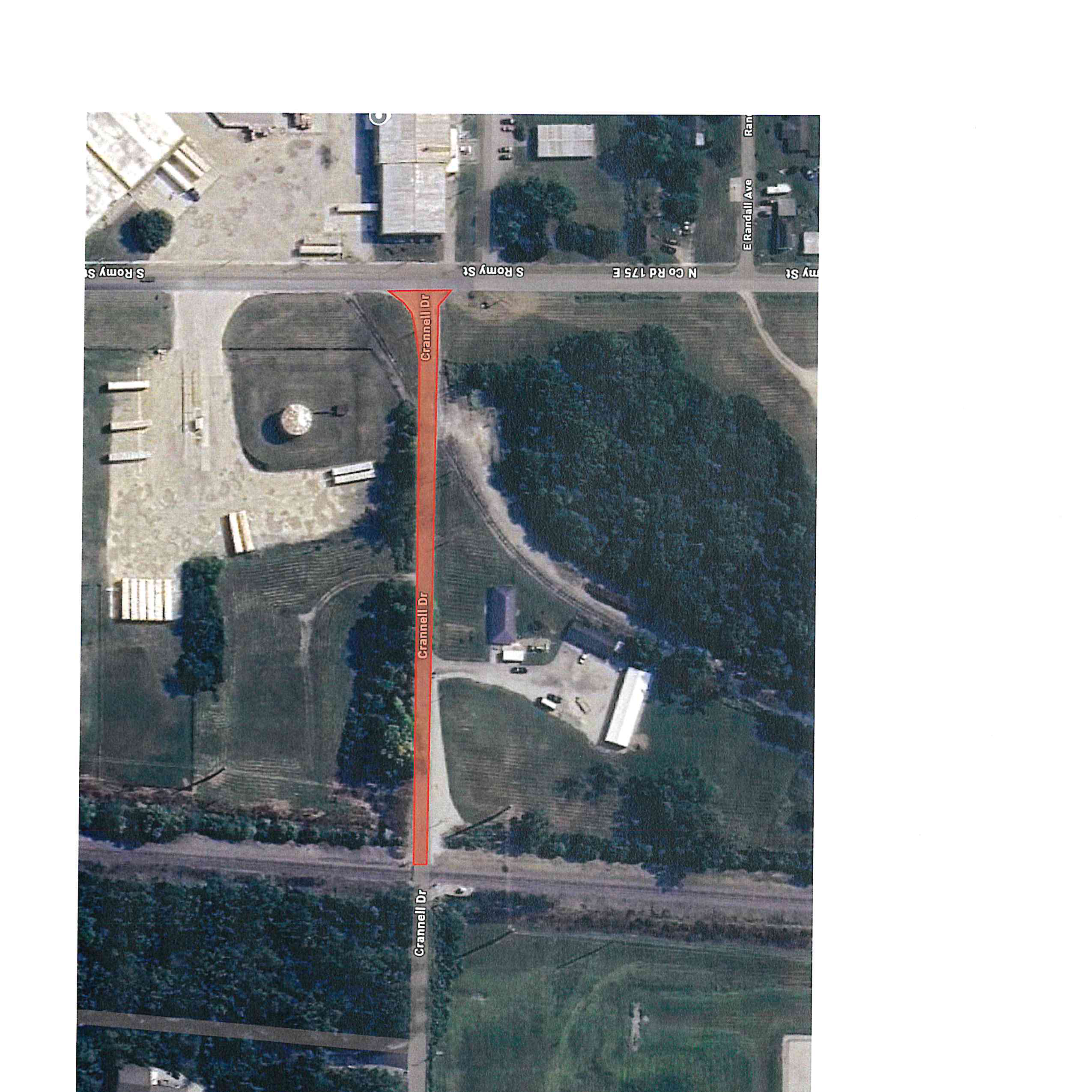 Aerial map view showing Crannell Drive highlighted with a red arrow pointing east toward S Romy St and N Co Rd 175 E